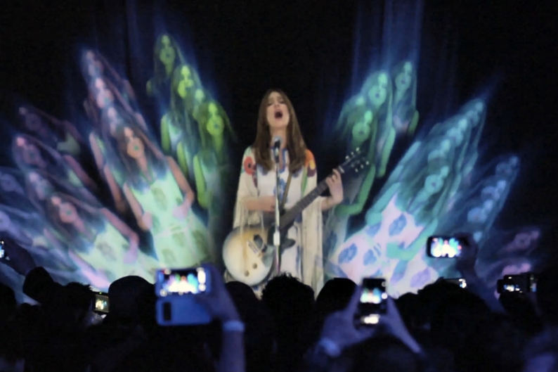 Feist performs as a hologram at a Samsung launch party. Photo courtesy of spin.com