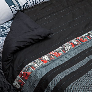 A more "adult" look to the comic themed bed sheets. Image courtesy of ThinkGeek. 