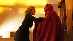 Skyler Samuels as Grace Gardner in Scream Queens, trying to unmask The Red Devil. Photo courtesy of TVInline.com